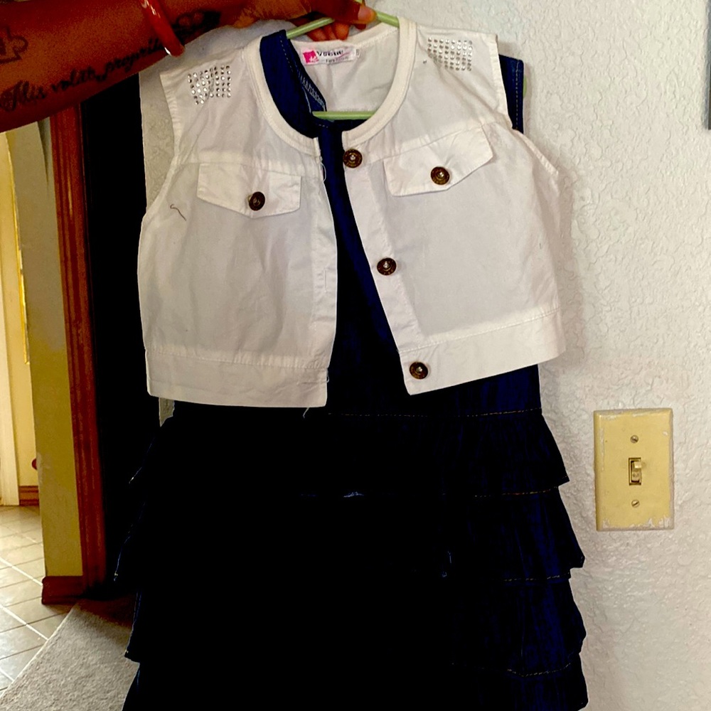 Blue Jean ruffle dress with white vest, zipper in back. Vest is removable.